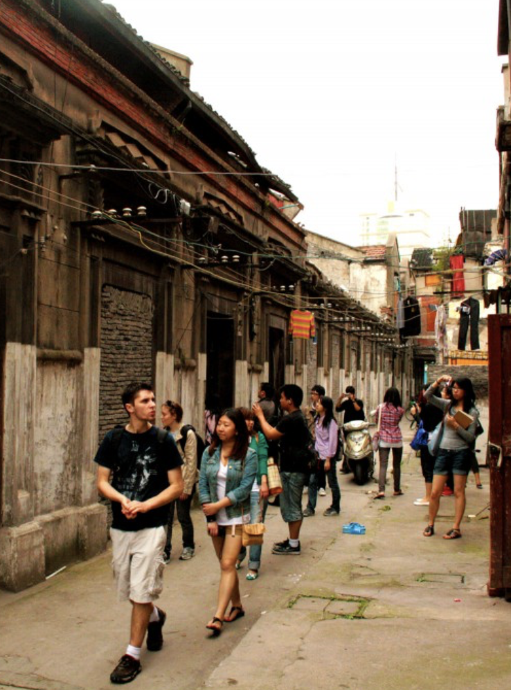 Students walking in Downtown Shanghai, near Xintaindi