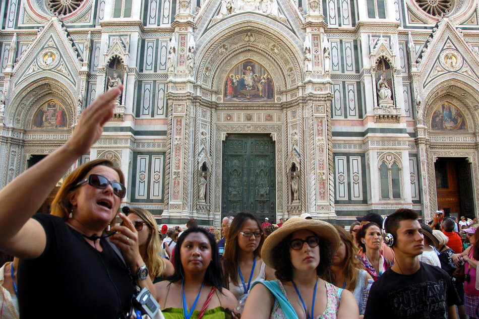 Tour guide and group at Duomo, Florence