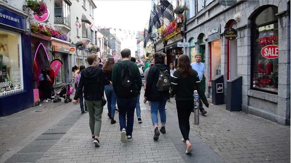 Four students walking in downtown Galway