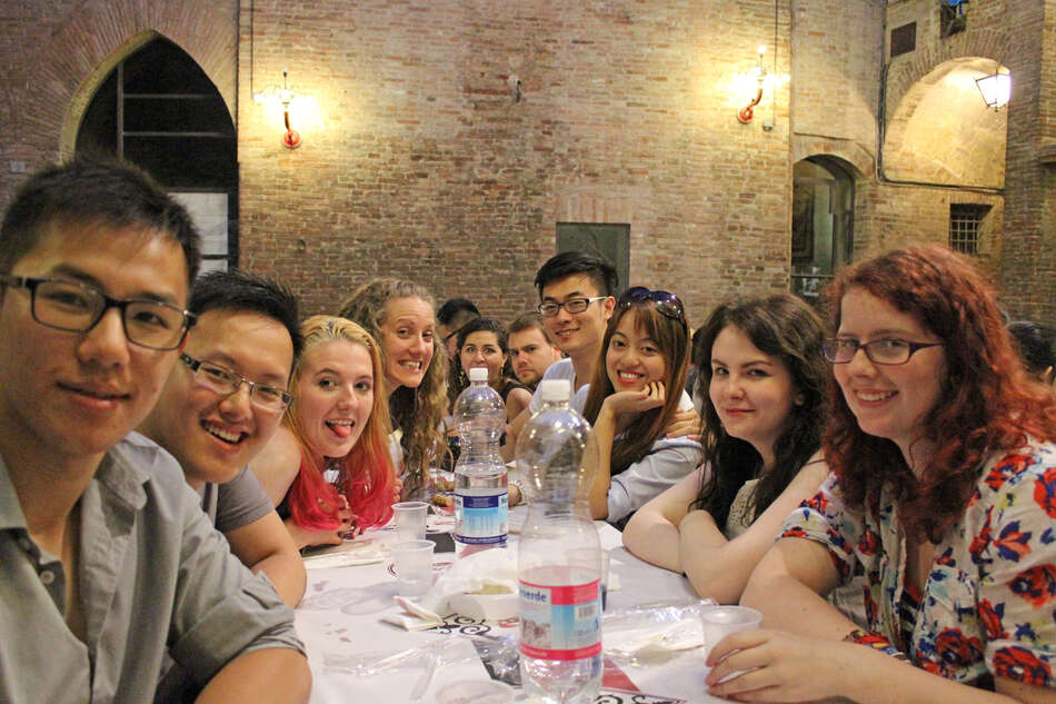 Eight students at Contrada dinner