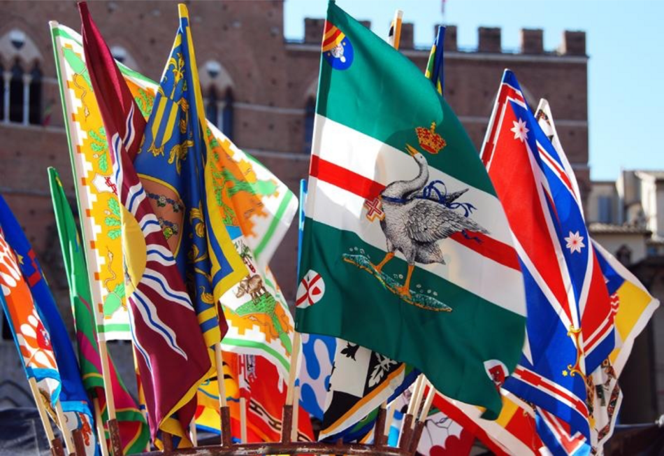 Close up picture of contrada flags.