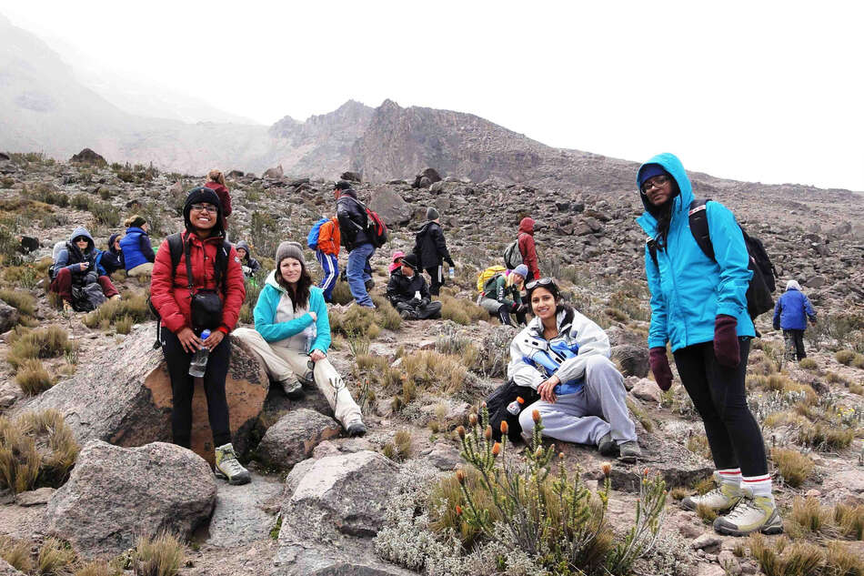 Students resting half way up volcano
