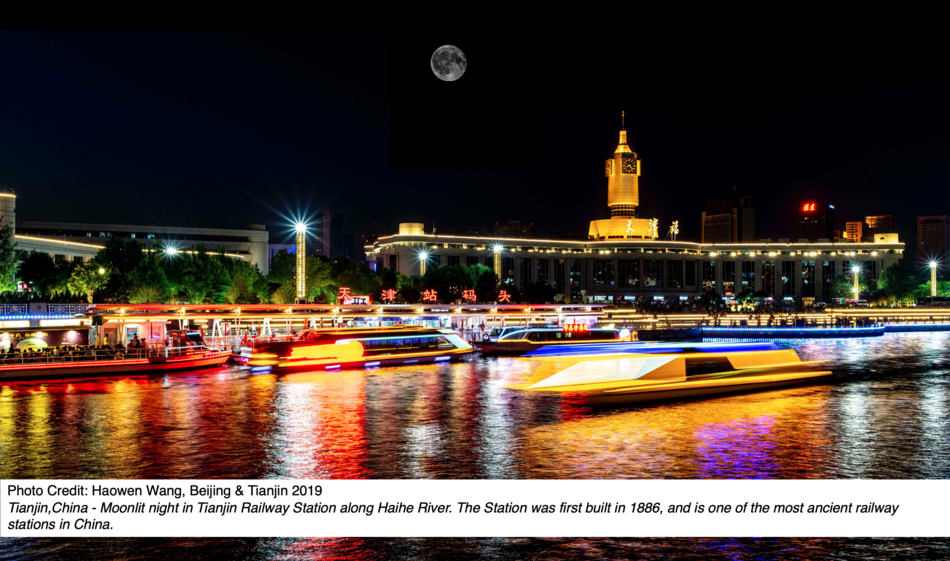 Tianjin,China - Moonlit night in Tianjin Railway Station along Haihe River. The Station was first built in 1886, and is one of the most ancient railway stations in China.