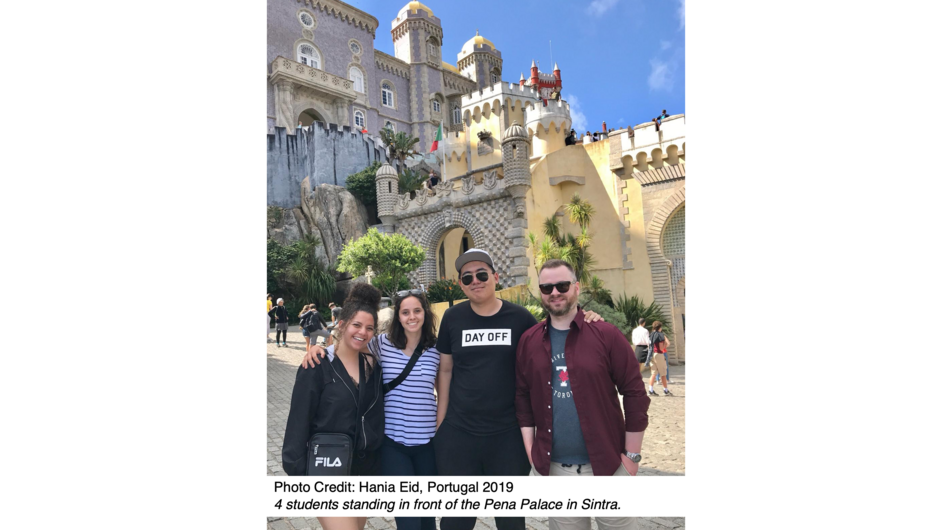 4 students standing in front of the Pena Palace in Sintra.