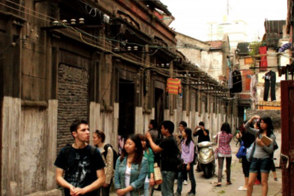 Students walking in Downtown Shanghai, near Xintaindi