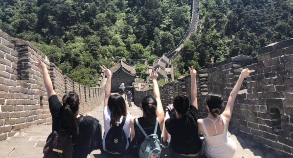 Five students at the Great Wall of China