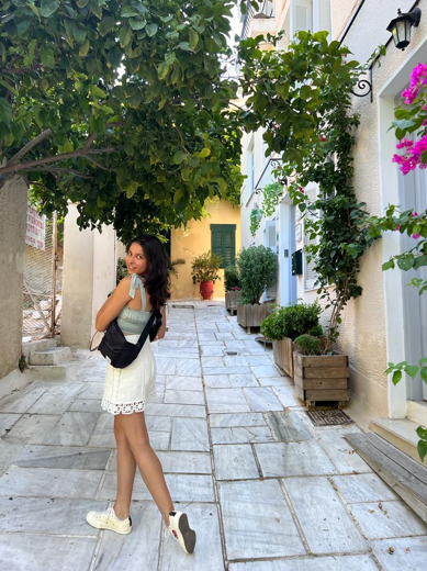 Solana poses on a street in Athens