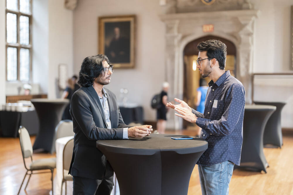 Omer talks to one of the students during the reunion.